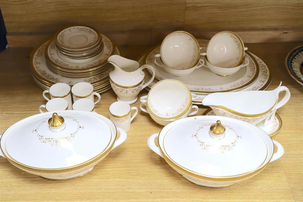 A Royal Doulton Belmont pattern part dinner and coffee dinner service with gilt decoration